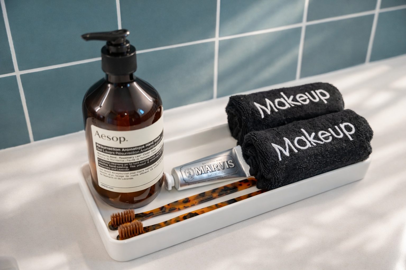Aesop bath amenities arranged on a counter inside a Hotel SOMA casita