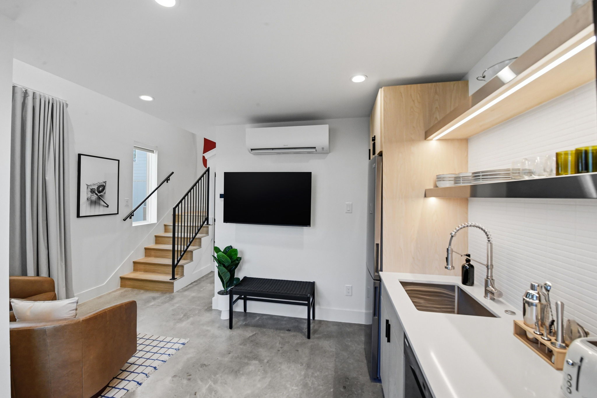 Living area of a private two-story casita at Hotel SOMA in Fort Worth